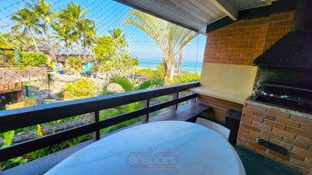 Varanda frente mar com churrasqueira