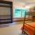 SuÃ­te 3 com beliche e sub-cama, ar condicionado quente e frio, e ventilador de teto