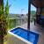 Varanda e Piscina com Vista PanorÃ¢mica para o Mar
